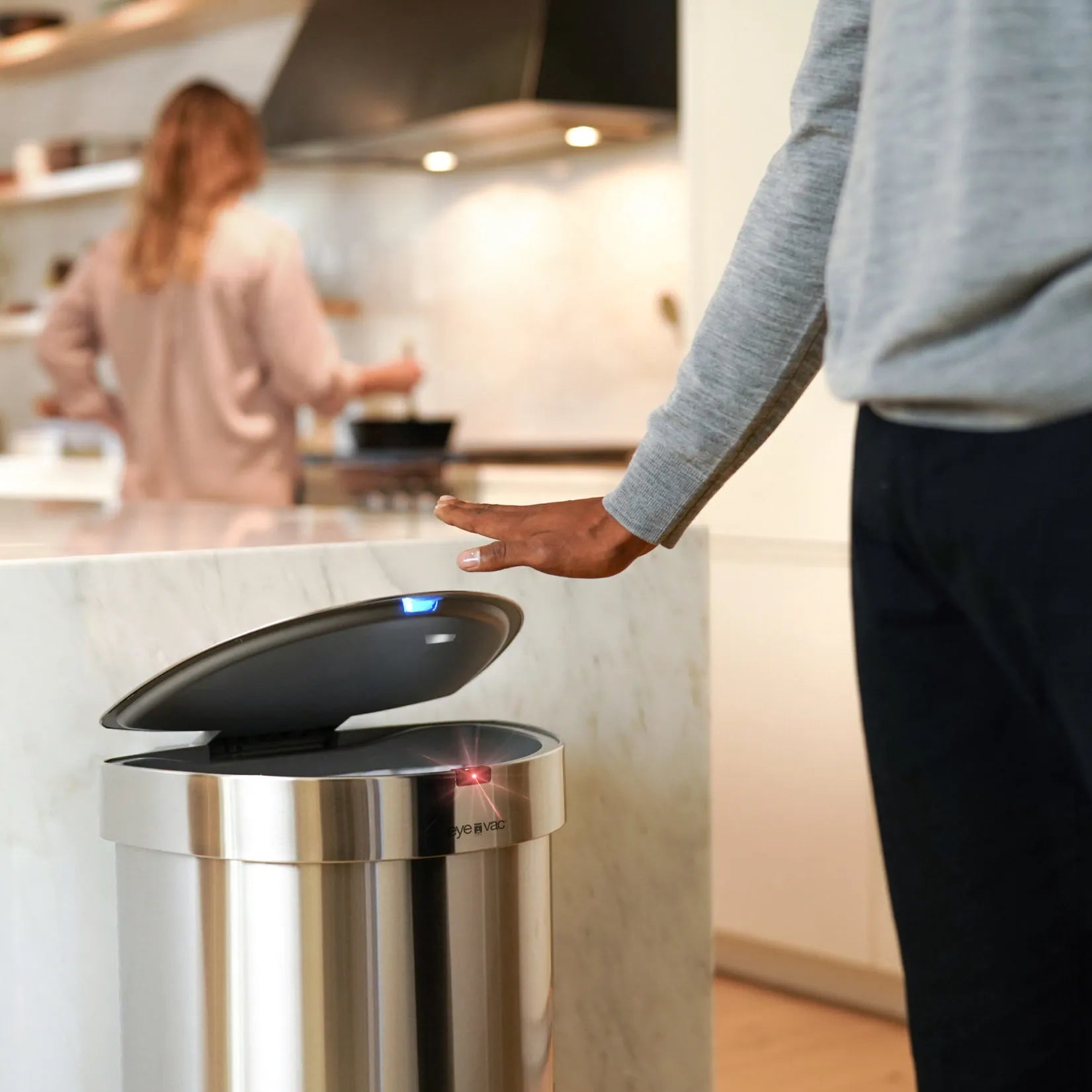 EyeVac Plus vacuum and trash bin